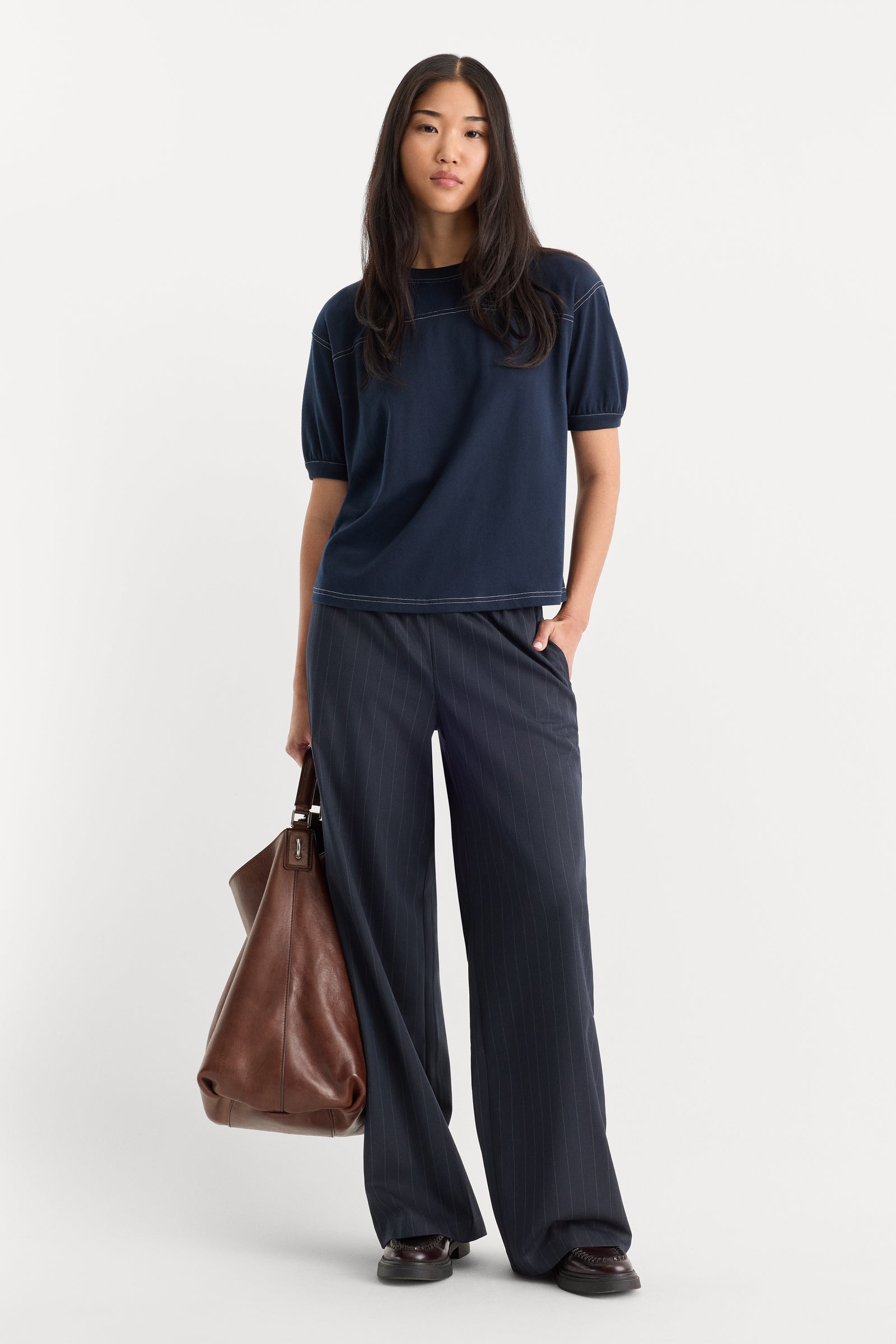 THE PINSTRIPE PULL ON TROUSER | NAVY PINSTRIPE-1 | GOOD AMERICAN | MODEL