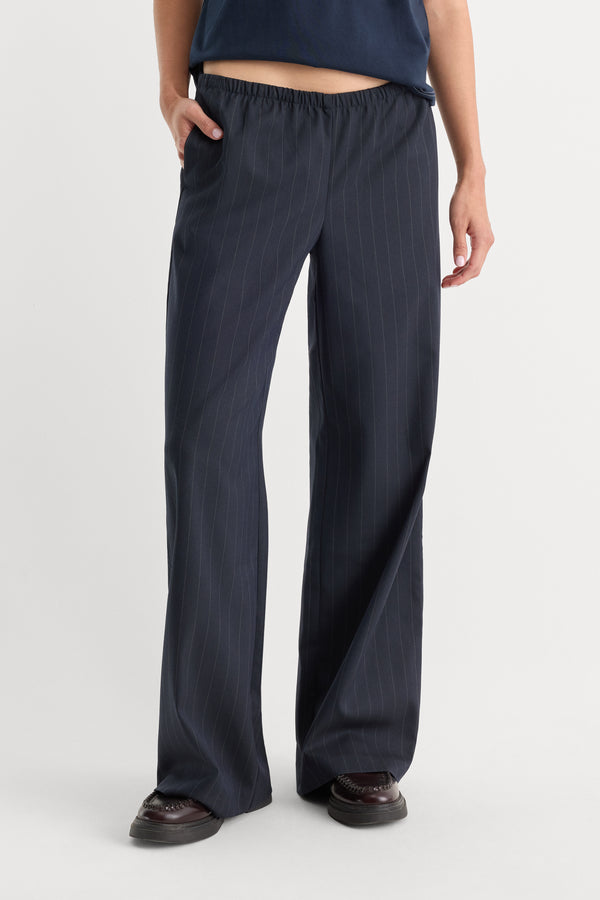 THE PINSTRIPE PULL ON TROUSER | NAVY PINSTRIPE-3 | GOOD AMERICAN | MODEL