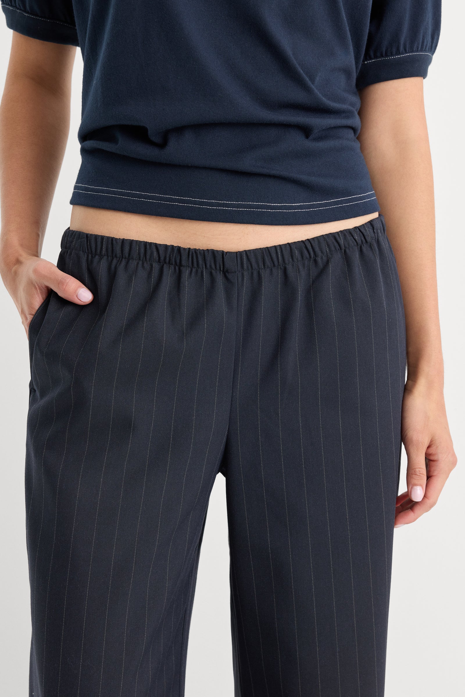 THE PINSTRIPE PULL ON TROUSER | NAVY PINSTRIPE-2 | GOOD AMERICAN | MODEL